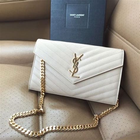 cream ysl purse|black and white ysl bag.